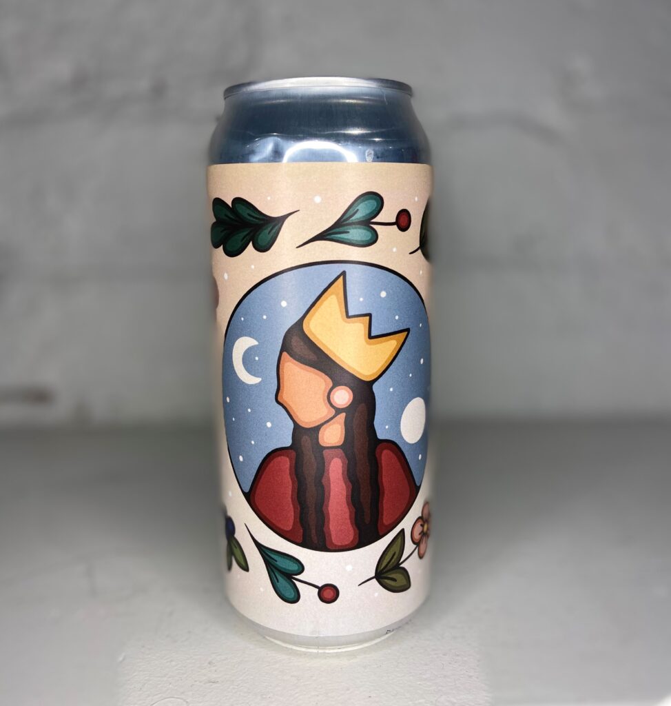 A can of 'Queen of Craft' from Wellington brewery.  The background of the label is light beige and features a simple drawing of a woman with light bronze skin and long dark hair wearing a gold crown in front of a sky with stars and the moon and sun.  Around the image of the women are various leaves, flowers and botanicals 